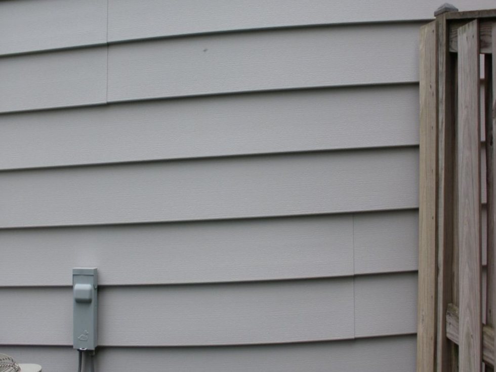 The same vinyl siding, clean after soft washing