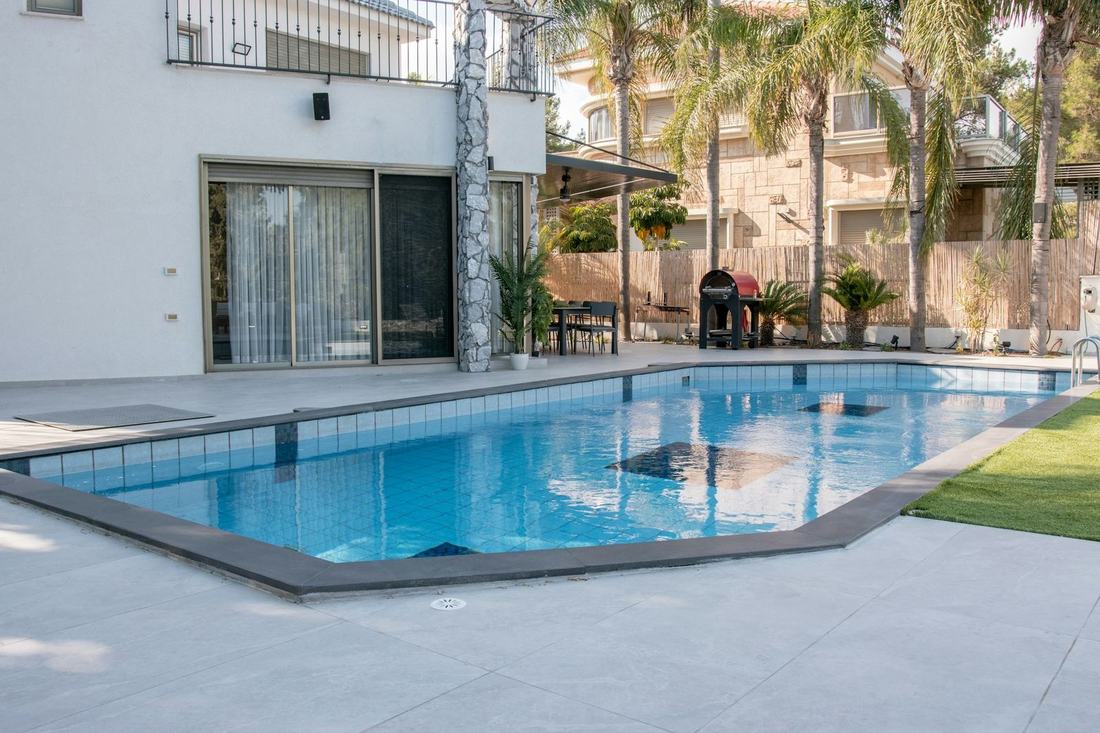 Clean backyard pool and patio