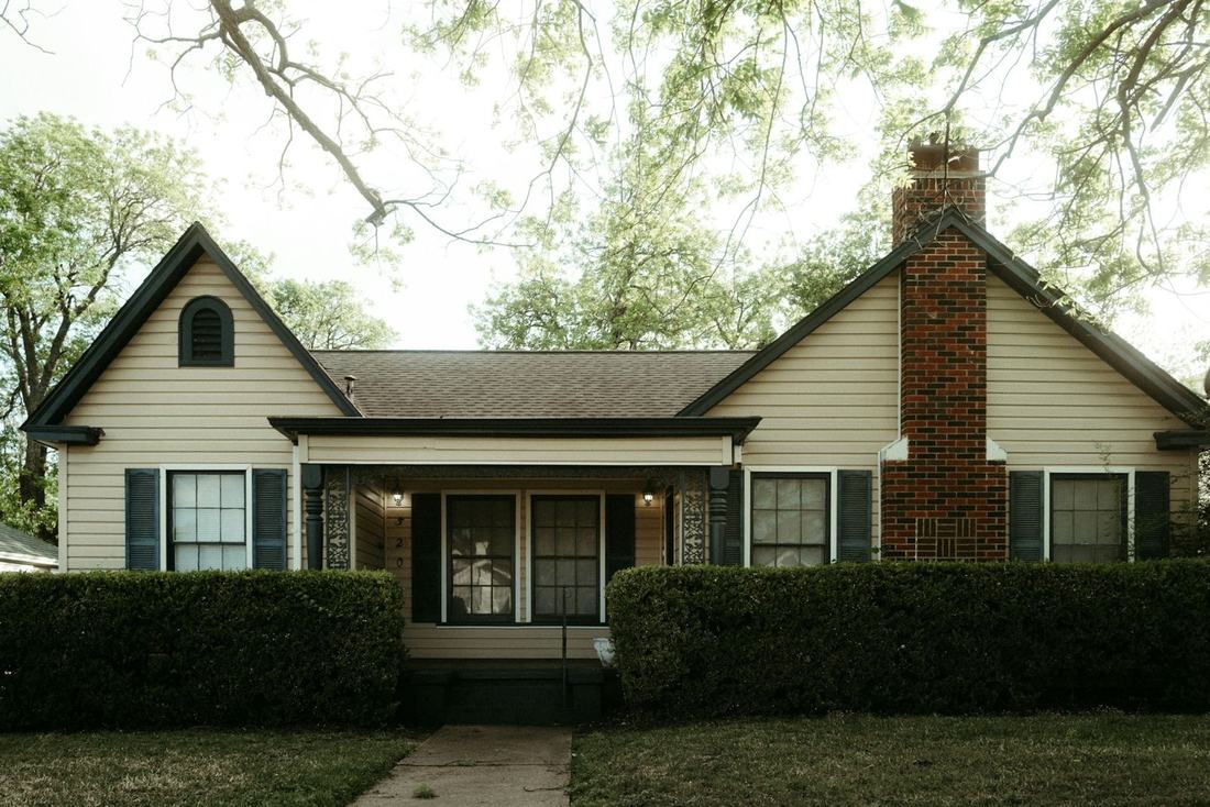 Single-story brick home with a front porch