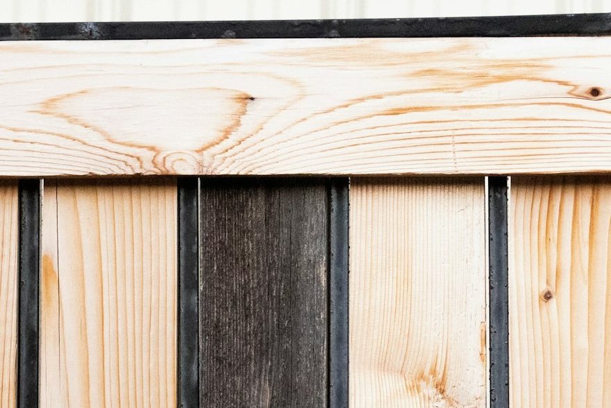 New pine boards on the same fence